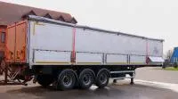 Полуприцеп-зерновоз с алюминиевым кузовом Тонар-98883, боковая разгрузка